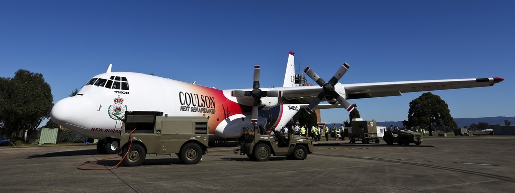 'Thor', a C-130 Hercules contracted to the NSW Government to assist in fighting bushfires, on the hard stand at RAAF Base Richmond. *** Local Caption *** RAAF Base Richmond will be used to provide airfield support services to Large Air Tanker and Very Large Air Tanker aircraft contracted to the New South Wales (NSW) Government from 01 September 2015 to 20 January 2015, assisting with NSW Rural Fire Service (RFS) efforts to combat bushfires. Defence is providing a number of services including aircraft parking and security, access to fuel and refuelling facilities, equipment storage, use of resources including water, aircrew office space, and meals and accommodation for up to 20 people, as required. Facilitating the aircraft at RAAF Base Richmond is intended to maximise aircraft utility and provide access to all areas of NSW in the event of a bushfire emergency. State and Territory Governments have primary responsibility for the protection of life, property and the environment, and for coordinating and planning an emergency response or recovery within their jurisdictions. Ground-based and aerial bush fire fighting is a highly specialised field that requires equipment and training that, in general, Defence does not possess. RAAF Base Richmond will be used to provide airfield support services to Large Air Tanker and Very Large Air Tanker aircraft contracted to the New South Wales (NSW) Government from 01 September 2015 to 20 January 2016, assisting with NSW Rural Fire Service (RFS) efforts to combat bushfires. Defence is providing a number of services including aircraft parking and security, access to fuel and refuelling facilities, equipment storage, use of resources including water, aircrew office space, and meals and accommodation for up to 20 people, as required. Facilitating the aircraft at RAAF Base Richmond is intended to maximise aircraft utility and provide access to all areas of NSW in the event of a bushfire emergency.